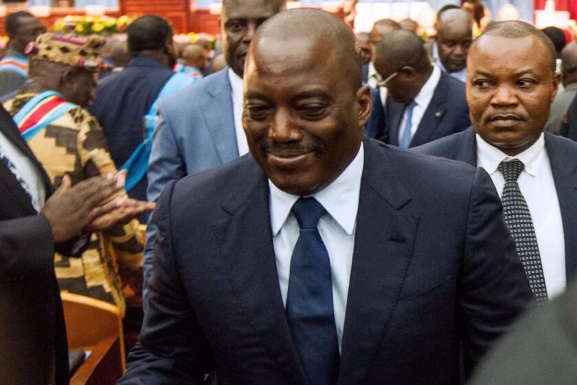 Congo President Joseph Kabila, center, in Parliament in November.