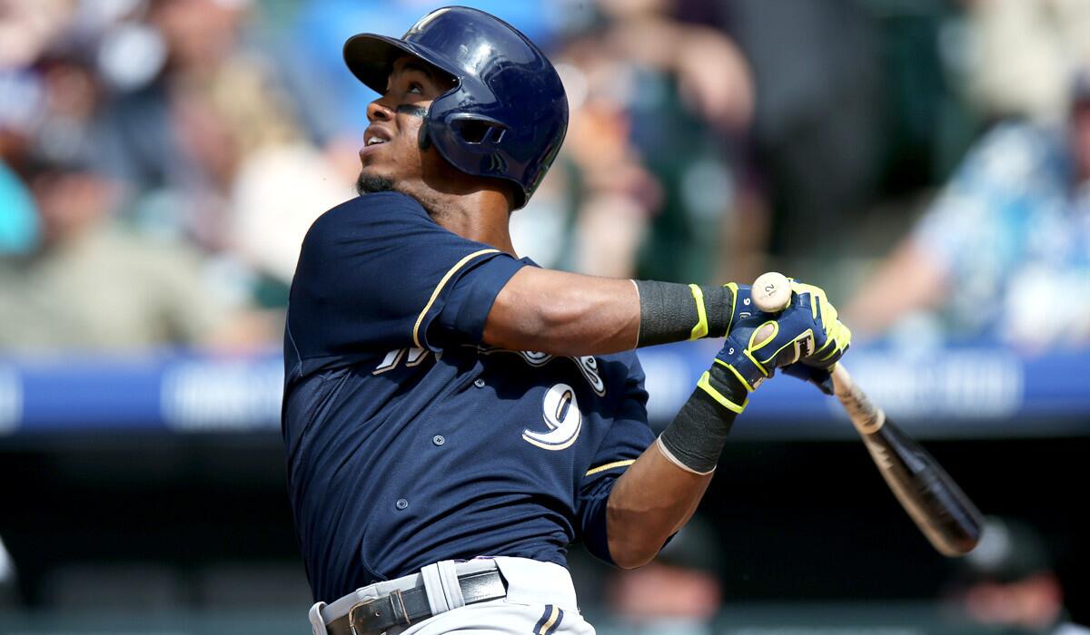 Brewers shortstop Jean Segura flies out against the Colorado Rockies in the fifth inning of a game last month in Denver.
