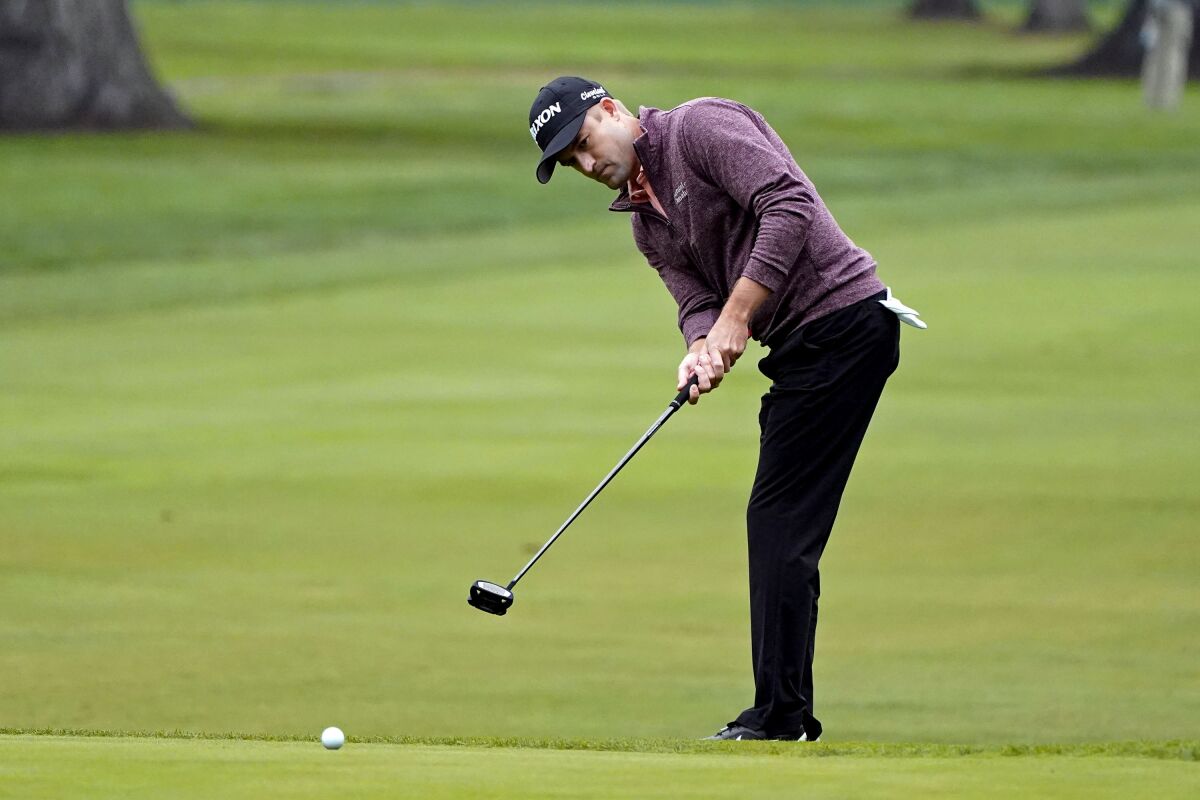 Russell Knox, of Scotland, putts up to the 13th green of the Silverado Resort North Course during the first round of the Safeway Open PGA golf tournament Thursday, Sept. 10, 2020, in Napa, Calif. (AP Photo/Eric Risberg)