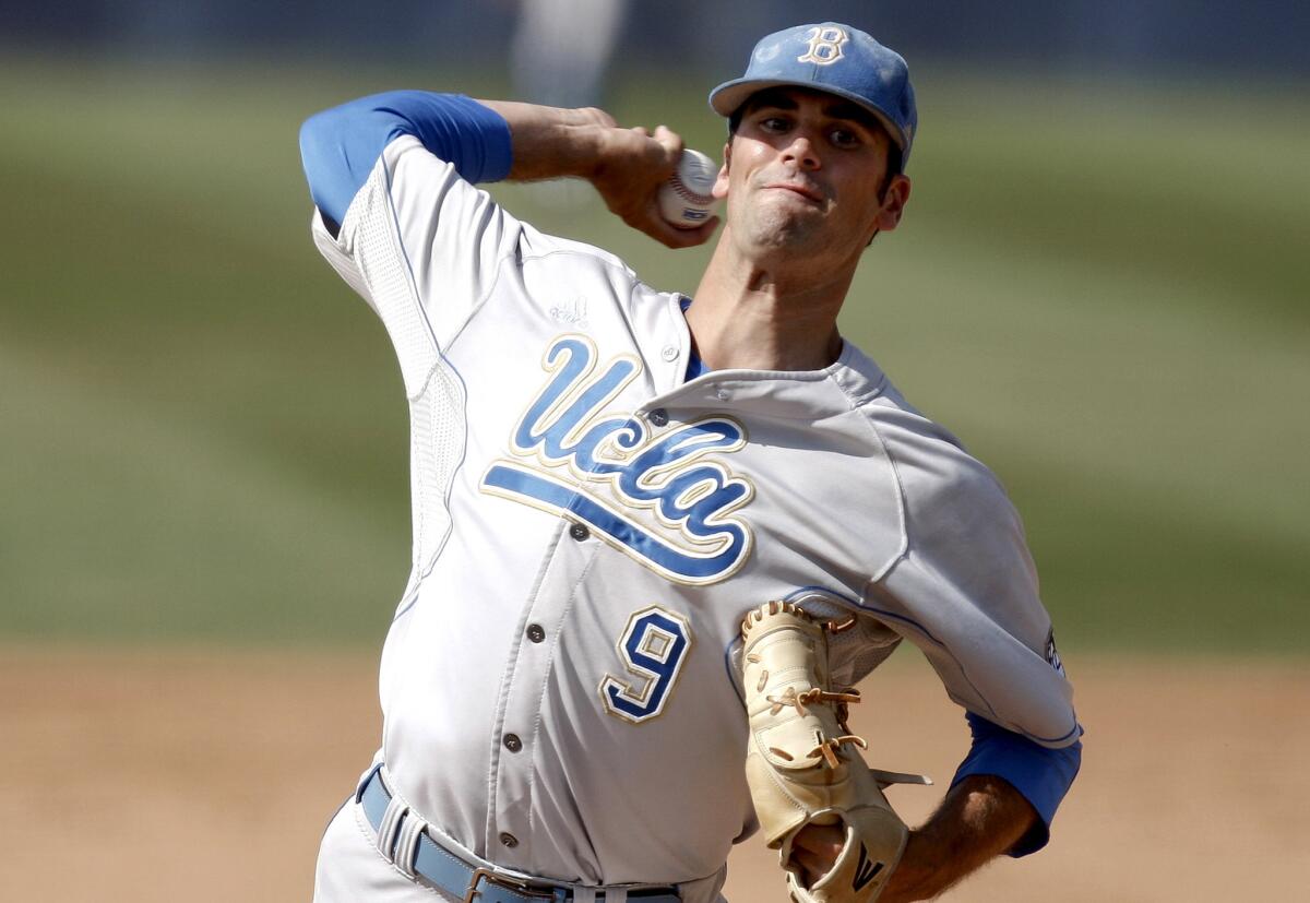 UCLA pitcher Adam Plutko throws during the first inning against Cal State Fullerton in the super-regionals.