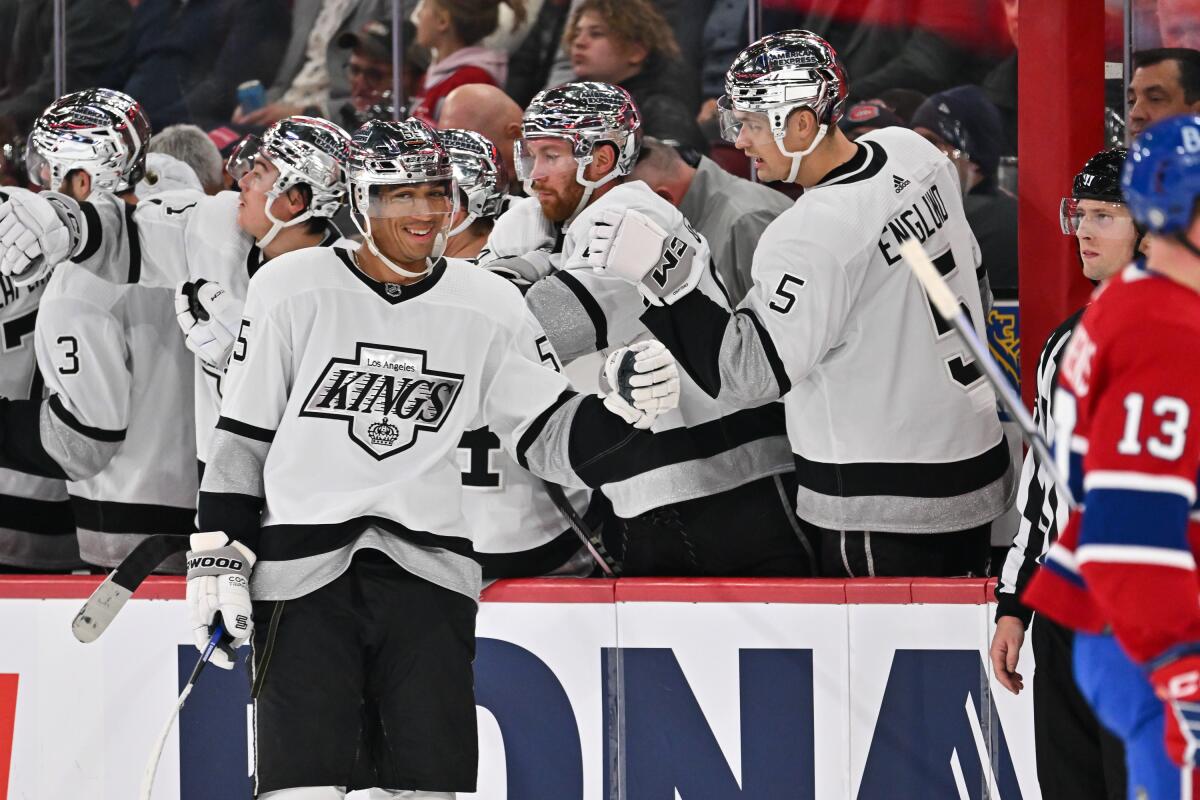 Kings forward Quinton Byfield celebrates with his teammates after scoring against the Montreal Canadiens.