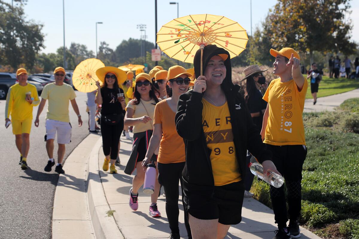 Participants in the "Walk for Vietnam" event on Oct. 2 at Mile Square Park Tennis Center in Fountain Valley.