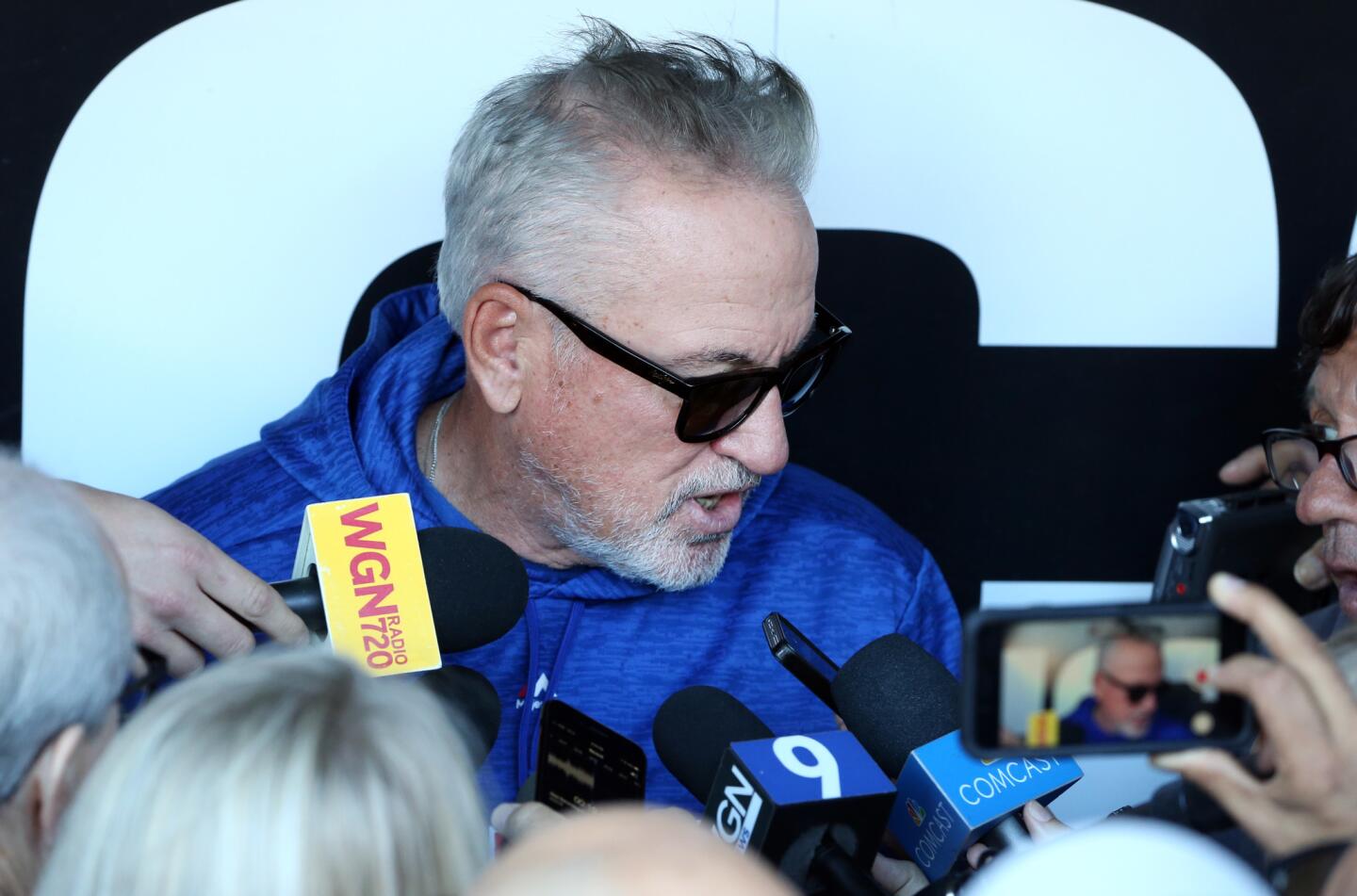 Cubs manager Joe Maddon sits in the dugout speaking with reporters before the start of the game between the Cubs and the White Sox at Guaranteed Rate Field on Saturday, Sept. 22, 2018.