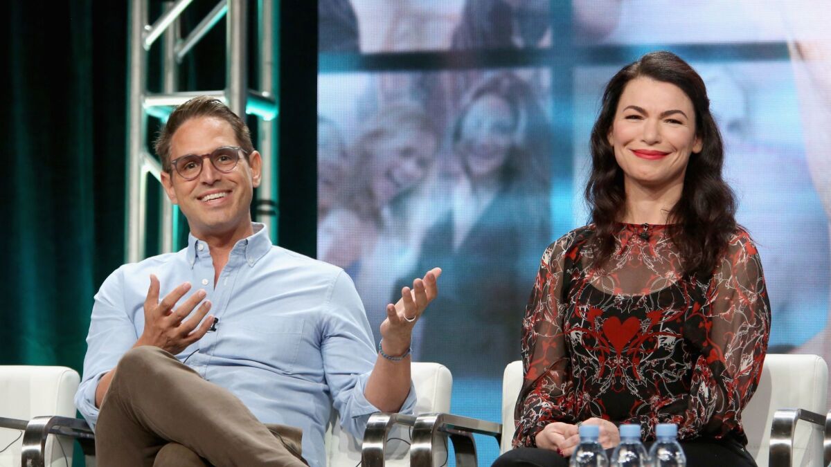 Co-Creators and Executive Producers Greg Berlanti and Sera Gamble of Lifetime's 'YOU' speak onstage during the 2018 Summer Television Critics Association Press Tour in Bevery Hills.