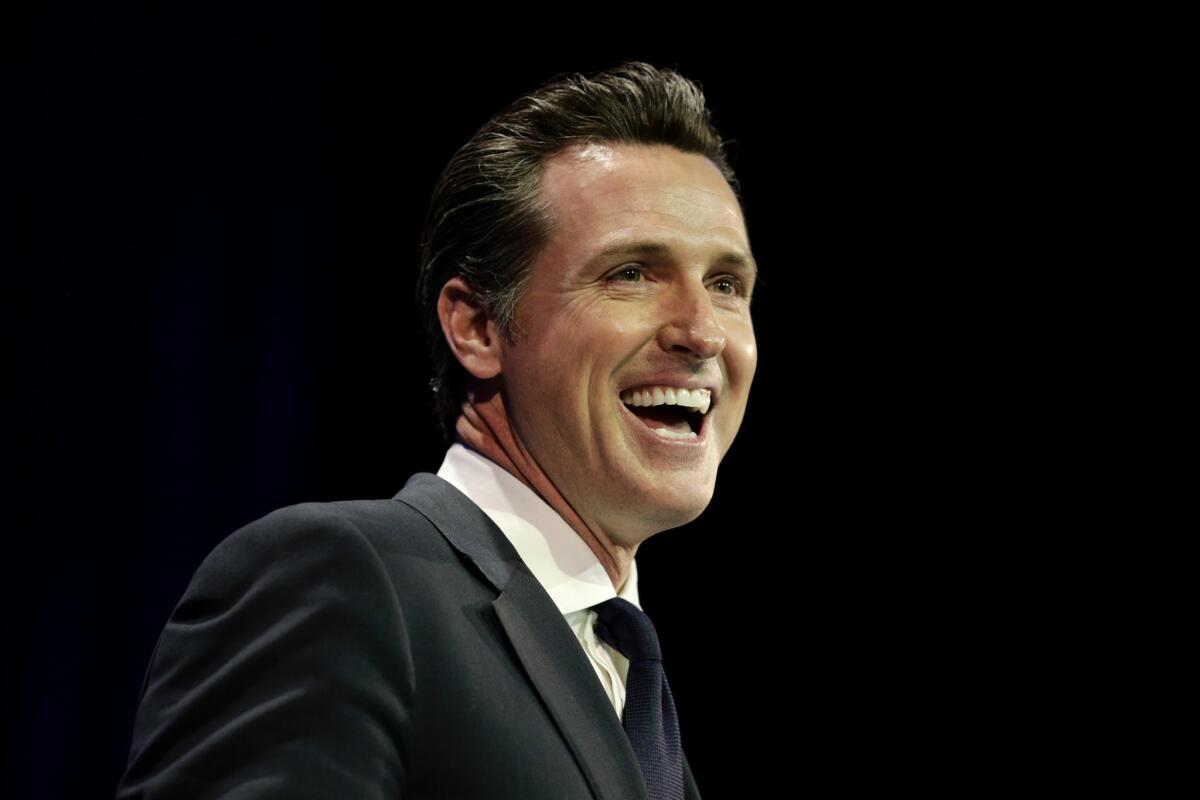 Lt. Gov. Gavin Newsom at the California Democrats' 2014 State Convention in Los Angeles. Newsom, who is running for governor in 2018, is offering campaign donors a chance to win tickets to a concert with the band Train.
