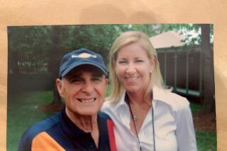 Jack Jones, who helped push for equality in women's tennis with the start of the Family Circle Cup in 1973, stands next to Chris Evert in an undated photo.