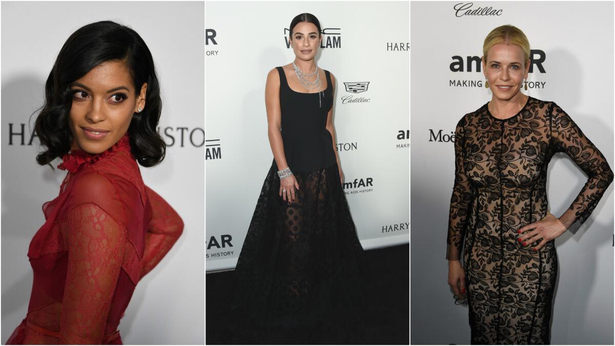 Stephanie Sigman, Lea Michele and Chelsea Handler arrive for amfAR's Inspiration Gala Los Angeles at Milk Studios on Thursday.