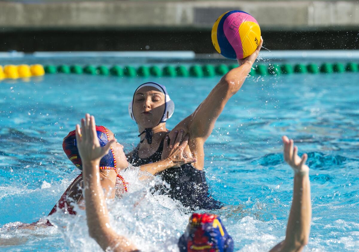 Emma Lineback of the U.S. takes a shot against Spain's Anna Espar during Wednesday's exhibition match.