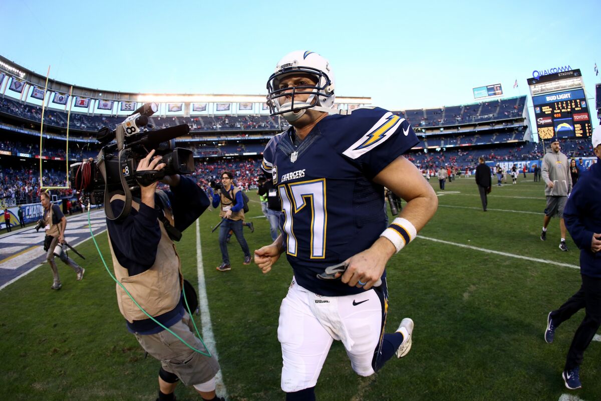 Philip Rivers leaves the field Jan. 1 after the Chargers' final game at Qualcomm Stadium.