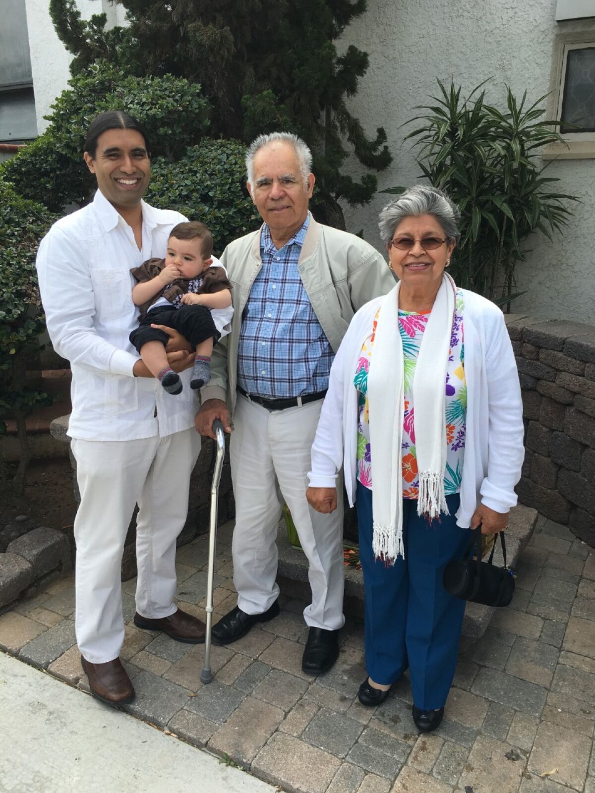 Oscar Ramos and his parents
