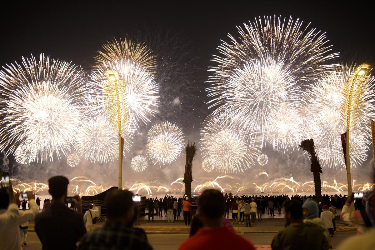 Fans watch fireworks after the World Cup 