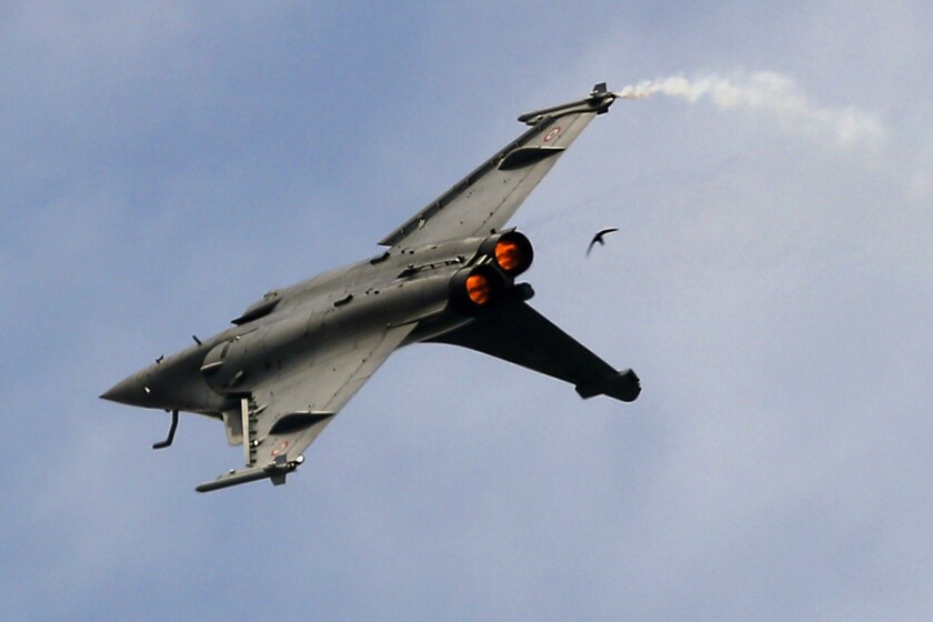 FILE- In this Tuesday, June 18, 2019, file photo, a Dassault Rafale fighter jet performs its demonstration flight at Paris Air Show, in Le Bourget, north east of Paris, France. Egypt is buying another 30 Rafale fighter jets from France, building up its fleet of the advanced warplane to 54, second only to the French Air Force. Both countries confirmed the deal separately on Tuesday. The Egyptian military said the purchase would be financed with a 10-year French loan. The value of the deal wasn't given. (AP Photo/ Francois Mori, File)
