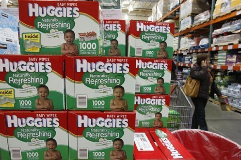 In this photo made Tuesday, Dec. 8, 2009, Huggies baby wipes, a Kimberly-Clark product, are seen on display at Costco in Mountain View, Calif. Kimberly-Clark said Friday, Jan. 22, 2010. price hikes for things like Huggies diapers helped to lift profits in the fourth quarter.(AP Photo/Paul Sakuma)