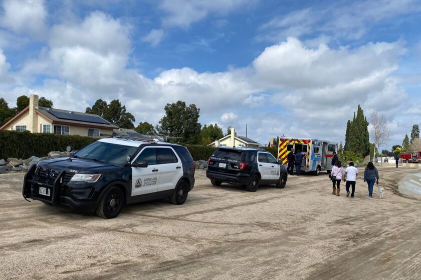First responders on the scene after a boy was swept away by fast moving waters in the Santa Ana River Sunday Mar. 12, 2023 (OFCA)