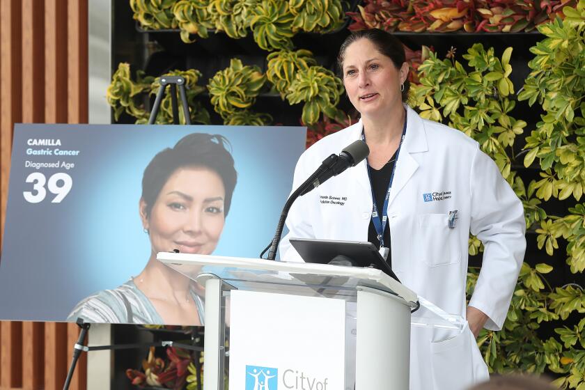 Radiation oncologist and breast cancer specialist Amanda Schwer, M.D. shares the reality of what its like to tell young patients they have a cancer diagnosis, as she speaks during City of Hope Orange County press conference in Irvine on Tuesday.
