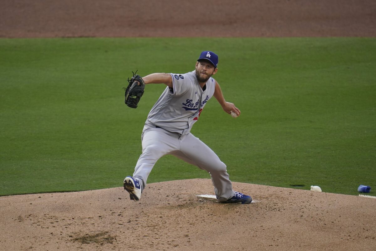 Dodgers starting pitcher Clayton Kershaw delivers against the San Diego Padres.