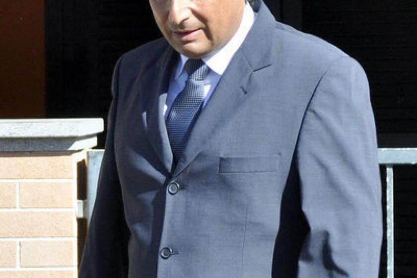 Francesco Schettino, the former captain of the Costa Concordia luxury cruise ship, leaves his house in the Italian city of Grosseto last week to attend a closed-door hearing.
