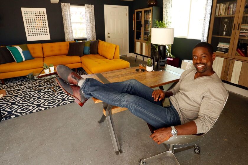 LOS ANGELES, CA, AUGUST 22, 2017 -- Emmy-Award winning actor Sterling K. Brown spends time in his favorite room, a converted garage in his midtown home in Los Angeles on August 22, 2017. Brown played Christopher Darden in, "The People v. O. J. Simpson: American Crime Story, " for which he won the Primetime Emmy Award for Outstanding Supporting Actor in a Limited Series or Movie. He currently stars in the hit ABC drama, "This is Us." (Genaro Molina/Los Angeles Times)