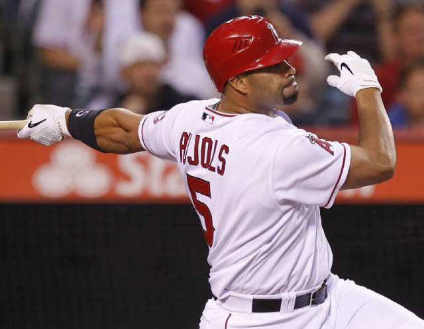 Albert Pujols strikes out against the Minnesota Twins on April 30.