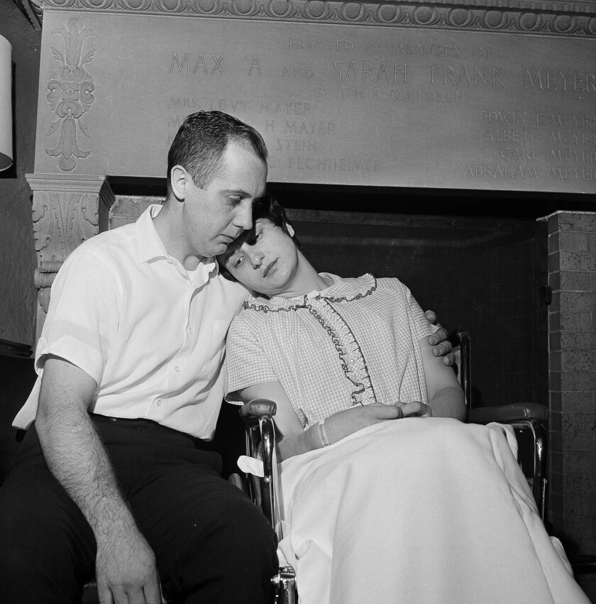 FILE - In this April 30, 1964 file photo, Chester and Dora Fronczak are pictured at a news conference in Michael Reese Hospital in Chicago. Their son, Paul Joseph, was kidnapped from the hospital the day after he was born. A woman in nurse's attire took the boy from the mother's arms midway during feeding, but didn't return him to the hospital nursery. (AP Photo/LO, File)