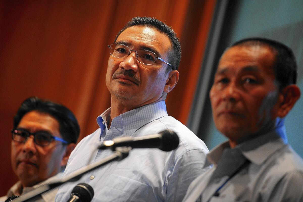 "I know this roller-coaster has been incredibly hard for everyone, especially for the families," Malaysia's defense minister, Hishammuddin Hussein, said at a news conference in Sepang, Malaysia.