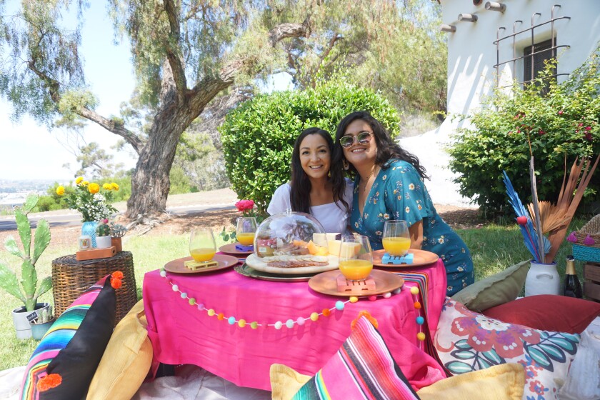 Owners of Las Chicas Picnics Andrea Lopez-Villafana and Yesenia Ortega at Presidio Park near Old Town.