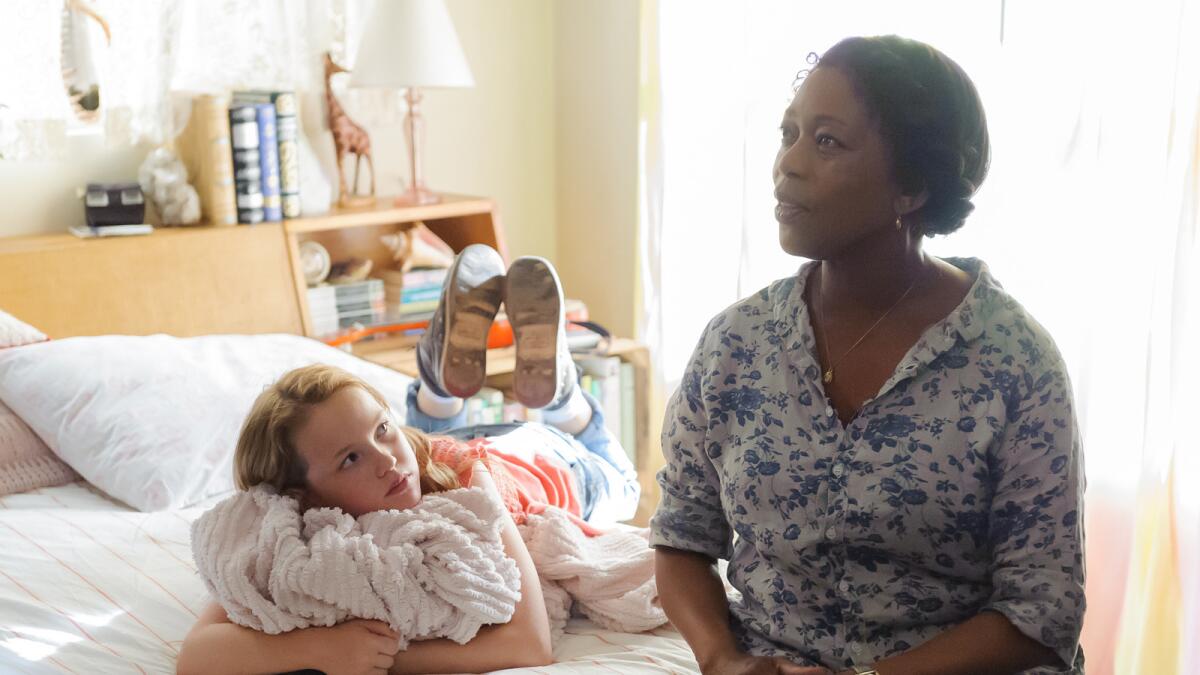 Talitha Bateman), left, and Alfre Woodard in the movie "So B. It."