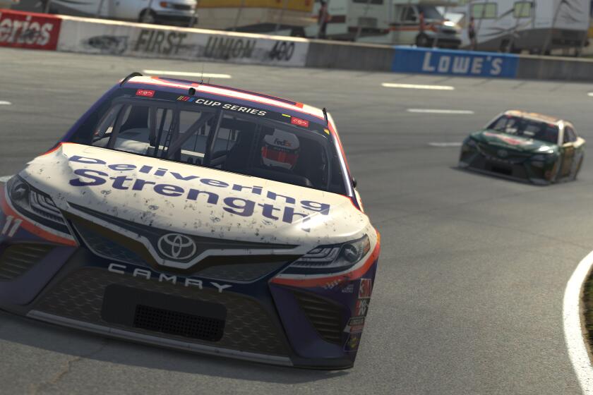 NORTH WILKESBORO, NORTH CAROLINA - MAY 09: (EDITORIAL USE ONLY) (Editors note: This image was computer generated in-game) Denny Hamlin, driver of the #11 FedEx Delivering Strength Toyota, drives during the eNASCAR iRacing Pro Invitational Series North Wilkesboro 160 at virtual North Wilkesboro Speedway on May 09, 2020 in North Wilkesboro, North Carolina. (Photo by Chris Graythen/Getty Images)
