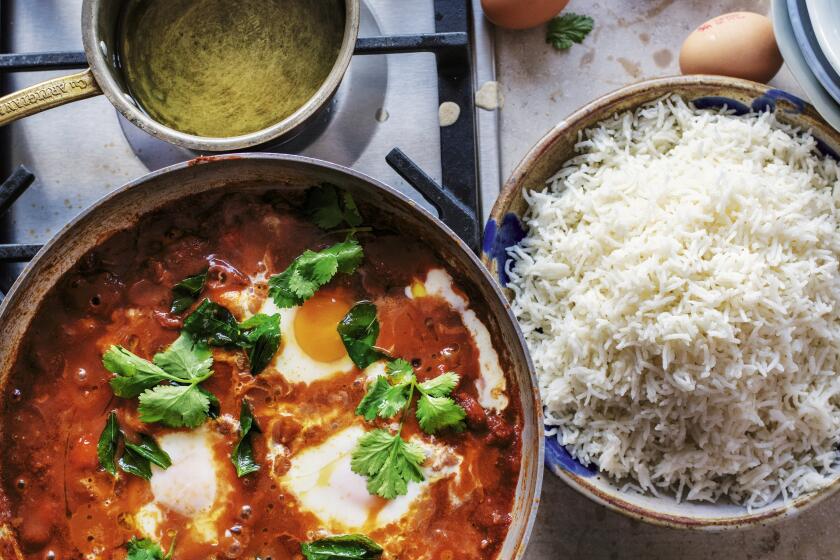 Egg sambal “shakshuka” inspired by the nasi lemak Helen ate growing up in Malaysia 