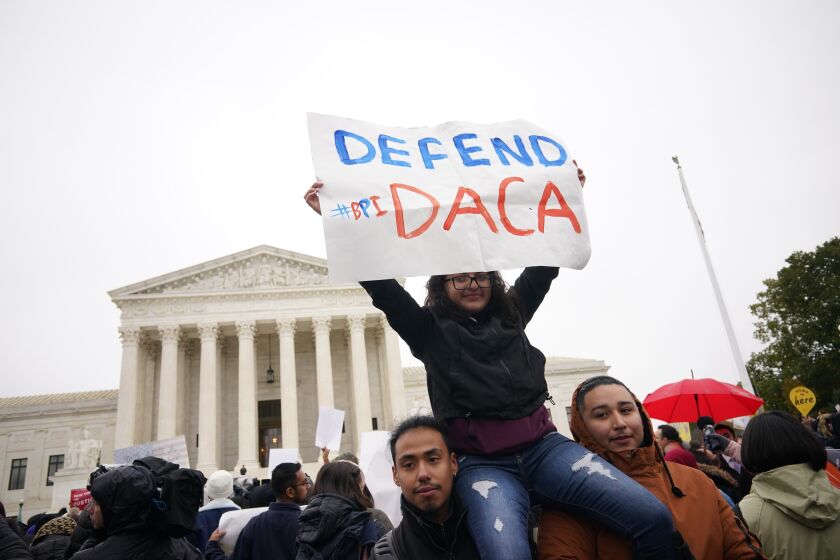 Immigration rights activists take part in a rally in front of the US Supreme Court in Washington, DC on November 12, 2019. - The US Supreme Court hears arguments on November 12, 2019 on the fate of the "Dreamers," an estimated 700,000 people brought to the country illegally as children but allowed to stay and work under a program created by former president Barack Obama.Known as Deferred Action for Childhood Arrivals or DACA, the program came under attack from President Donald Trump who wants it terminated, and expired last year after the Congress failed to come up with a replacement. (Photo by MANDEL NGAN / AFP) (Photo by MANDEL NGAN/AFP via Getty Images)