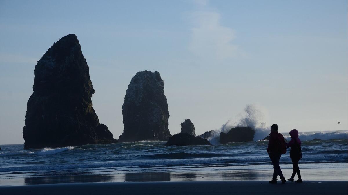 Haystack Rock is a popular attraction at Cannon Beach, Ore.