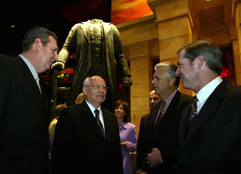 Former Soviet President Mikhail Gorbachev, second from left, stands outside the Russian-themed Red Square restaurant in the Mandalay Bay Resort in 2004. Gorbachev is talking with former Nevada Gov. Bob Miller, left, former Sen. John Ensign and Mandalay Resort Group's former president Glenn Schaeffer.