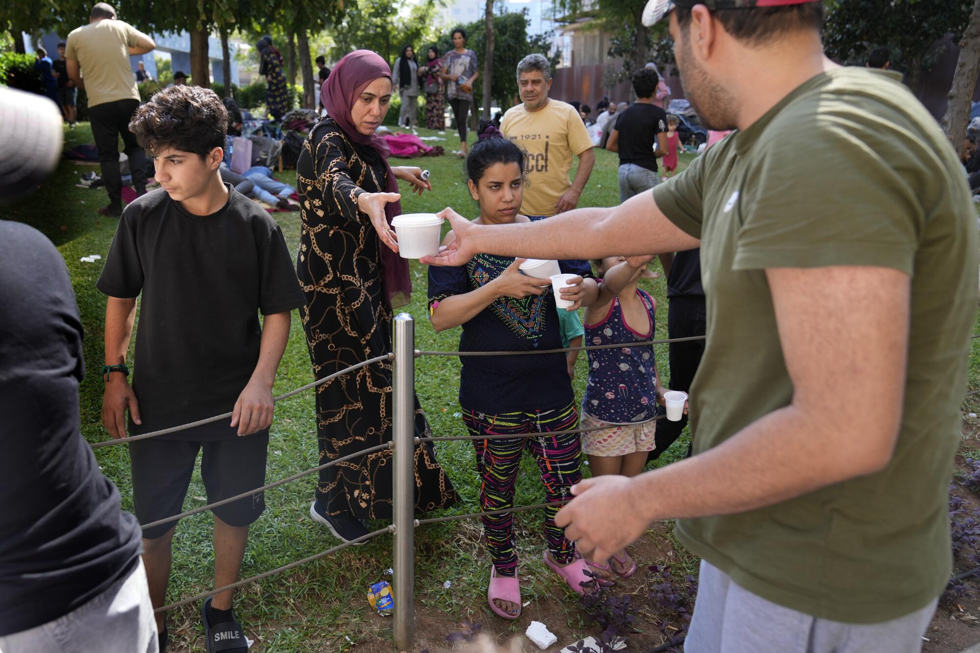 A man distributes food  