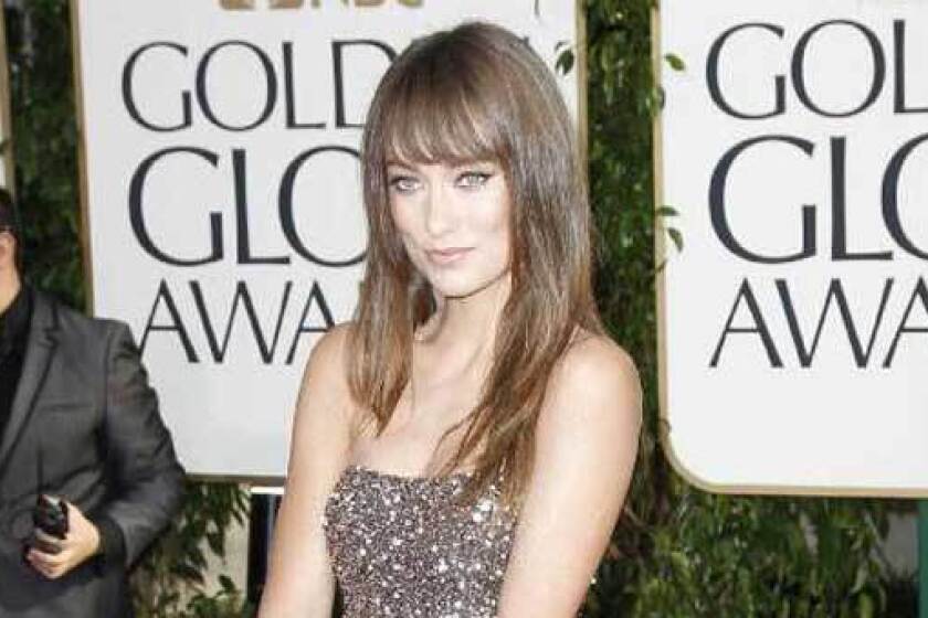 Olivia Wilde arrives at the 68th Annual Golden Globe Awards in January 2011 at the Beverly Hilton Hotel in Beverly Hills.