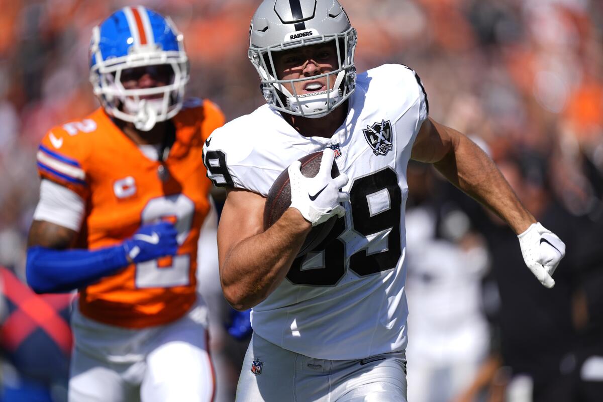 Las Vegas Raiders tight end Brock Bowers scores a touchdown against the Denver Broncos on Oct. 6.