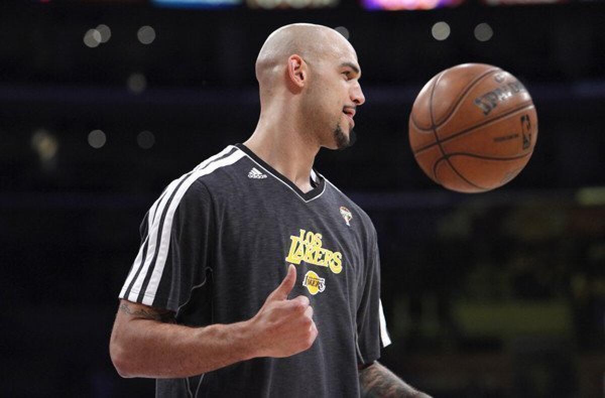 Robert Sacre averaged 1.3 points and 1.1 rebounds in six minutes a game during his 32 appearances with the Lakers last season.