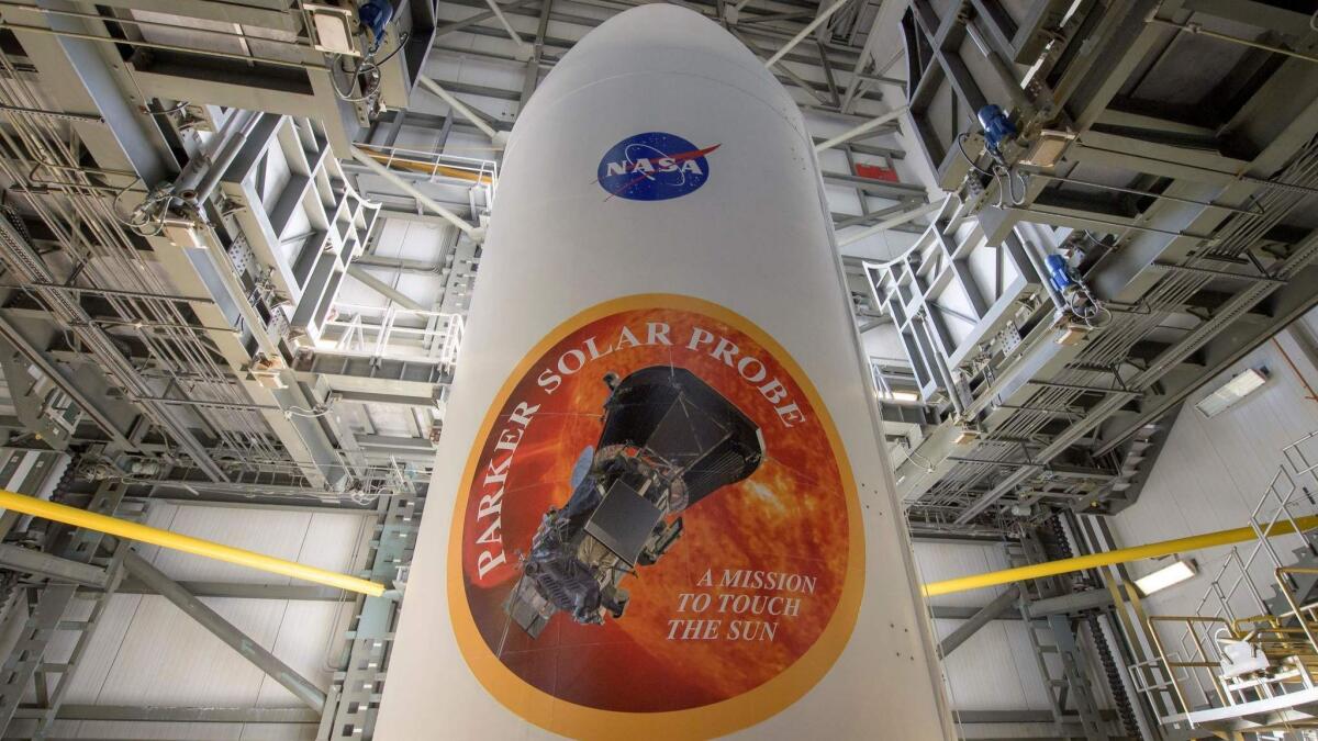 This handout released by NASA shows the United Launch Alliance Delta IV Heavy Rocket payload with the NASA and Parker Solar Probe emblems at Launch Complex 37, Cape Canaveral Air Force Station, Fla .