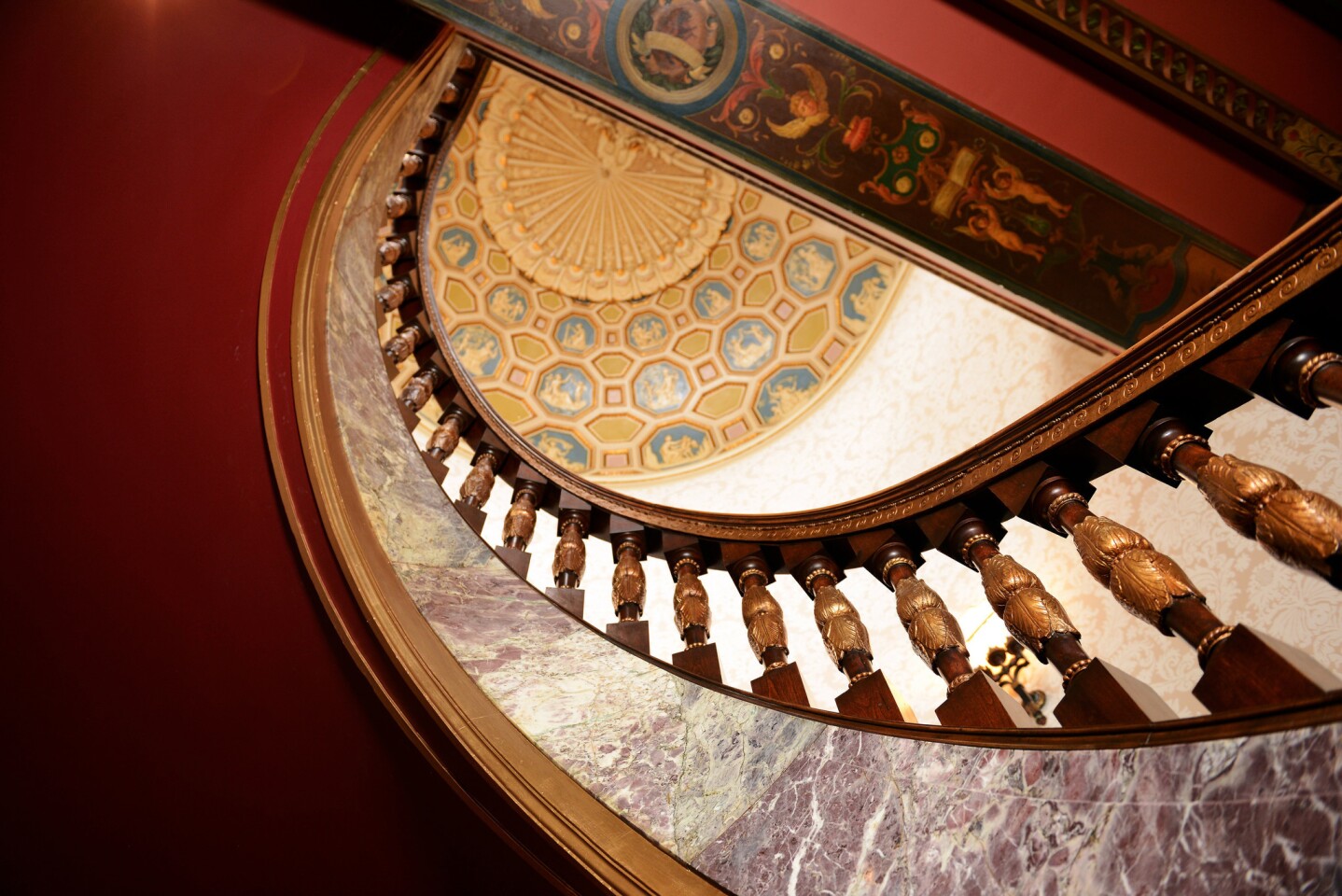 An ornate spiral staircase is a centerpiece of the lobby at the Broadmoor. The staircase was refurbished to commemorate the resort’s 100th anniversary this year.