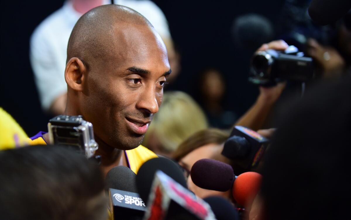 Superstar Kobe Bryant speaks to reporters during the Lakers' media day.