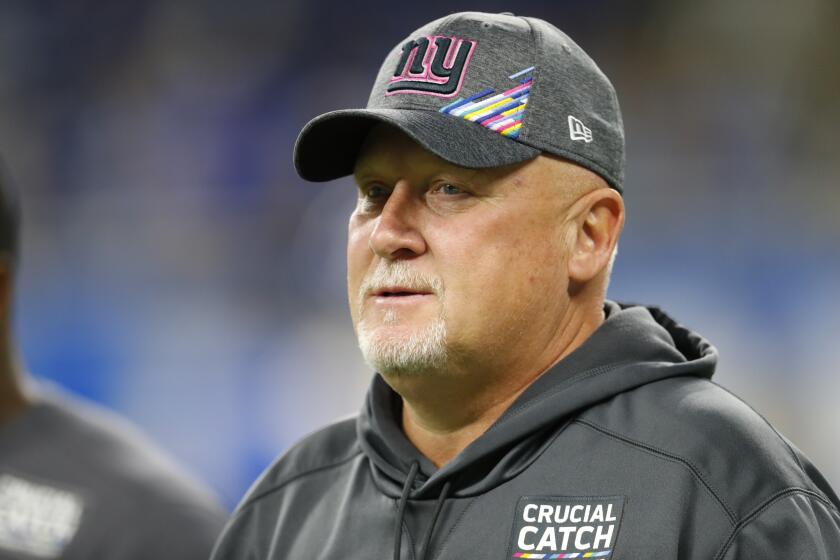 New York Giants' Bill McGovern watches against the Detroit Lions 