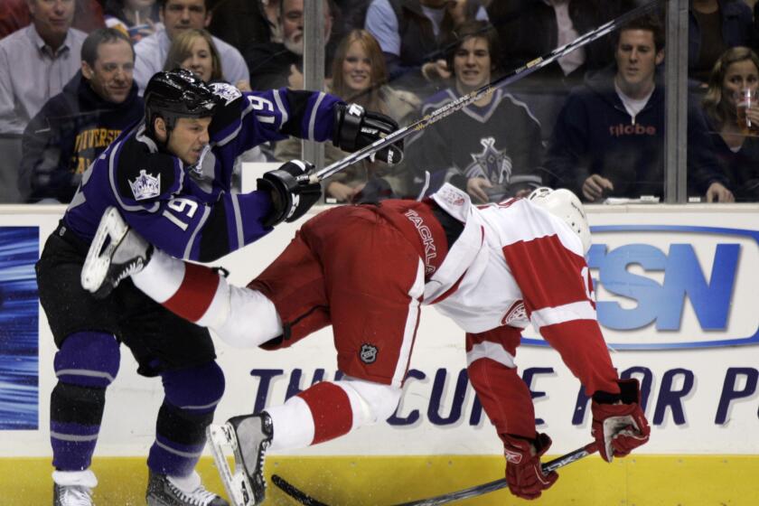 The Kings' Sean Avery checks Detroit's Pavel Datsyuk back in 2005. Avery made plenty of headlines. His post-game rants became productive moments ... for writers.