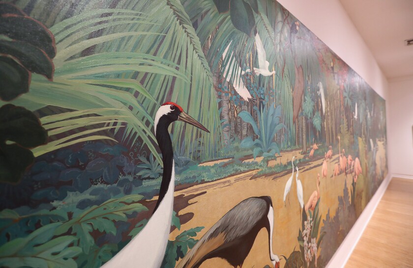A mural depicting exotic birds in a lush tropical setting is just one of the pieces in "An imaginative world" by Jessie Arms Botke.