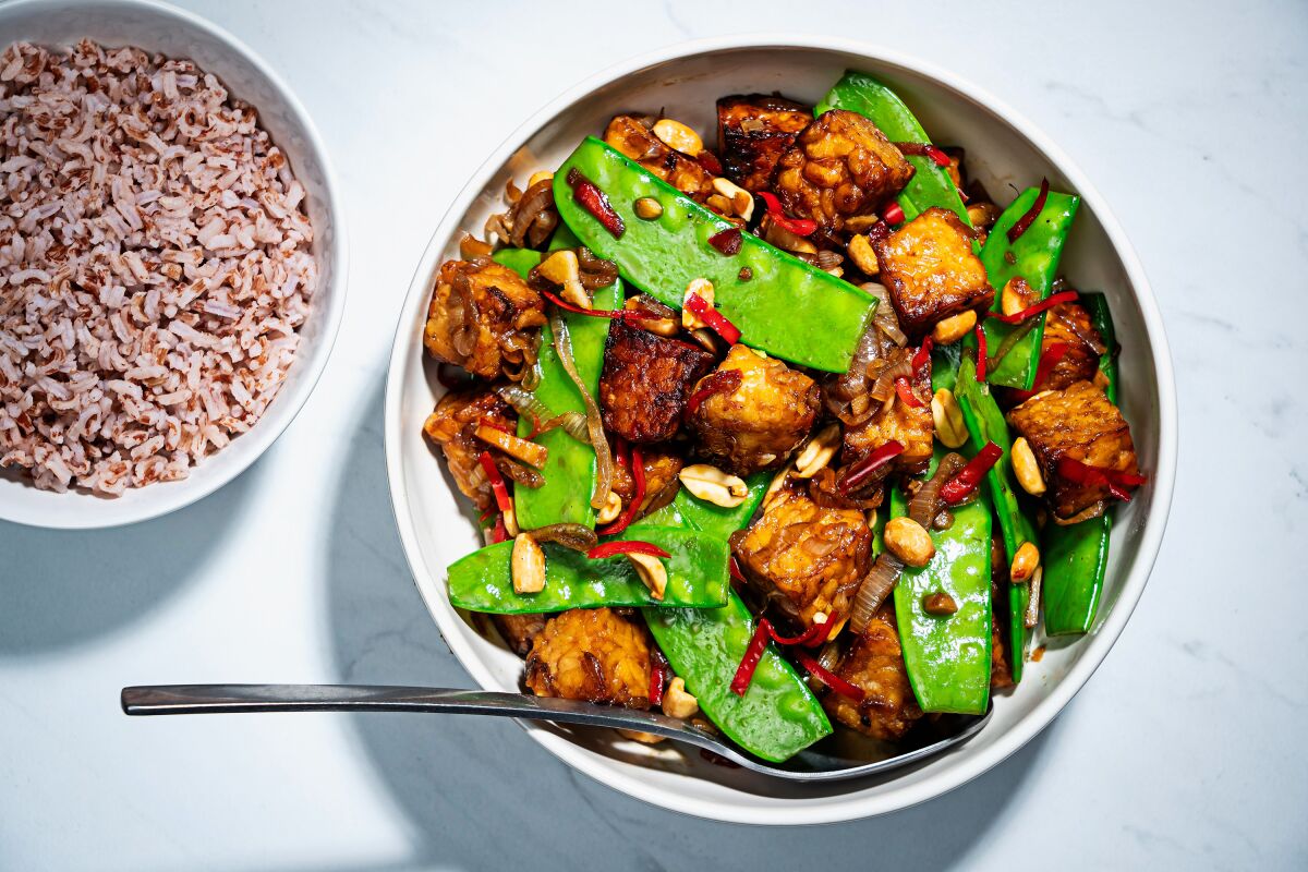 Tempeh in a fried and glazed dish.
