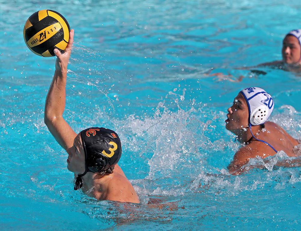 La Canada High School boys water polo player #3 Colin Nicholls gets away from the defense and scores a goal vs. San Marino High School at home in La Canada Flintridge on Thursday, Sept. 27, 2018. LCHS won 10-6.