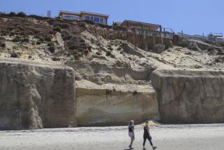 SAN DIEGO, CA - MAY 07: This is the section of bluff without a seawall in front of the home at 245 Pacific Avenue as seen from the beach on Friday, May 7, 2021 in San Diego, CA. (Eduardo Contreras / The San Diego Union-Tribune)