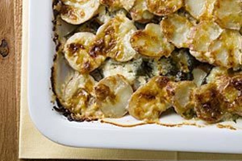 FROM THE GROUND UP: New potato and dandelion gratin is a spring variation on the winter standard.