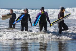 Members of the San Dieguito Newcomers Boogie-Boarding Group