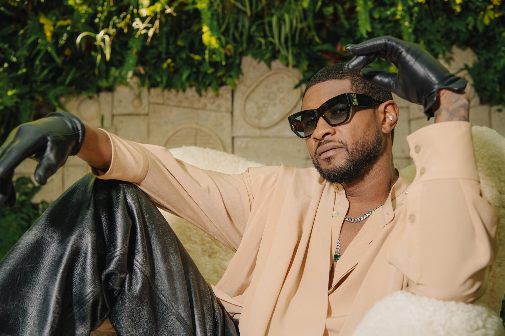 “Life in the entertainment industry at large is about how you perceive it, what you make it. If you want to make it a place where you go and just play your old records and you die, that ain’t what I use it for and that’s not what it should be,” Usher said. (Mariah Tauger / Los Angeles Times)
