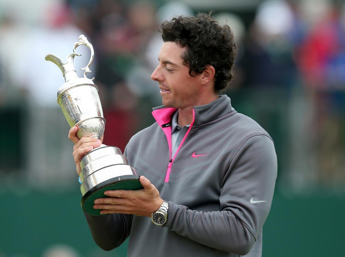 Rory McIlroy holds the Claret Jug after winning the 2014 British Open at Royal Liverpool Golf Course.