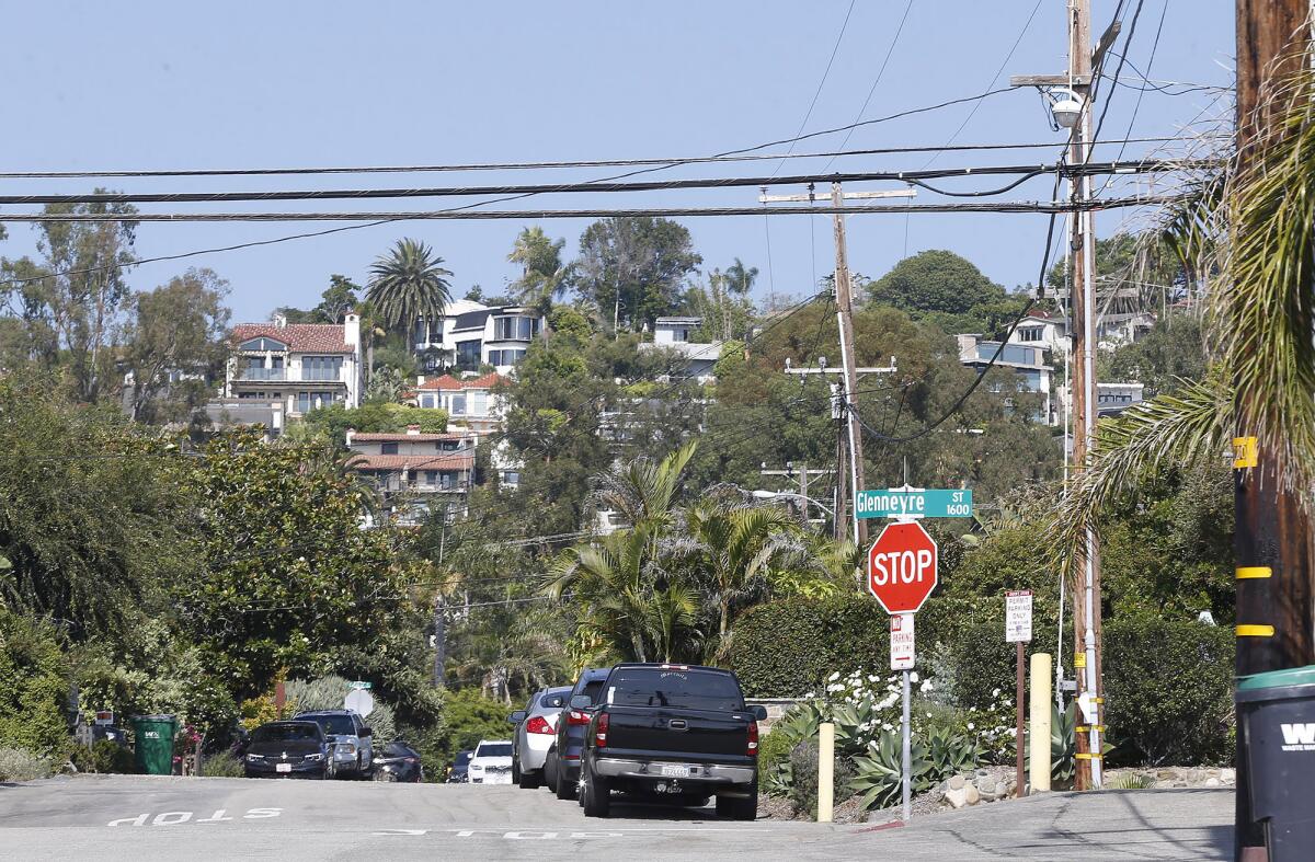 Power poles line Glenneyre Street and Agate Street near Fire Station No. 2 in Laguna Beach.